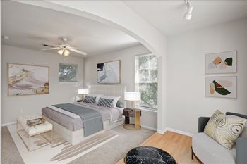 Bedroom with natural light and oversized windows